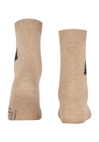 Beige Baumwollsocken mit gerippten Bündchen, auf der Außenseite mit einem schwarzen Baumdesign und einer glatten Textur. Verstärkter Fersen- und Zehenbereich.