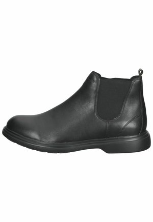 Stivaletto in pelle nera con pannelli laterali elasticizzati, punta rotonda e suola in gomma nera testurizzata. Fascetta sul retro per una facile calzata.