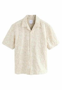Camisa de manga corta en tejido beige claro con un sutil patrón floral, que presenta un cuello y cierre de botones en la parte delantera.