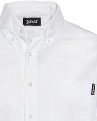 Witte katoenen overhemd met knopen, voorzien van een puntige kraag, een voorkeurszak en een merkteken. Textuurstof met knopen aan de voorkant.