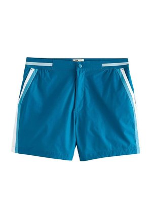 Kék férfi fürdőnadrág patenttal, csíkos derékpánttal, oldalzsebekkel és fehér függőleges díszítésekkel az oldalán.