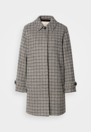 Wool coat in a black and white houndstooth pattern, featuring a collar, front button closure, and rolled sleeves with button detail.