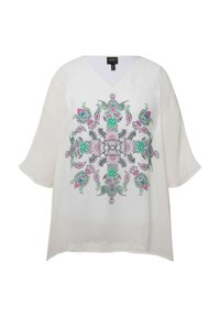 Blusa bianca con scollo a V e maniche ampie e fluide. Motivo decorativo centrale in verde, rosa e nero con motivi floreali.