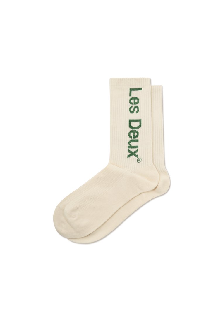 Krèmribbede sokker med grønt "Les Deux" tekst. Har en crewlængde design og blød tekstur. Enkel og funktionel stil.