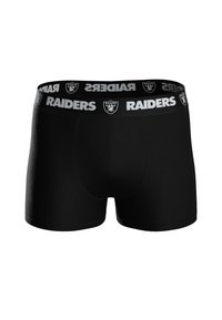 Boxer breves negros con un ajuste ceñido, que presentan un logo blanco de 'RAIDERS' en la cinturilla elástica y una textura suave.