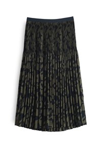 Jupe midi plissée avec une ceinture élastique. Tissu vert foncé avec un motif abstrait noir sur toute la surface, texture lisse.