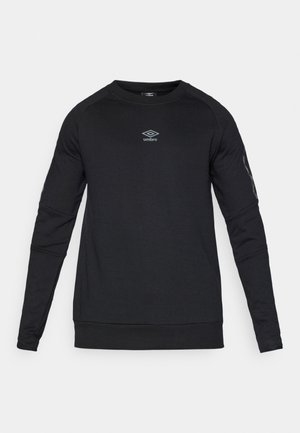 Sort langærmet sweatshirts lavet af bomuld. Har rund halsudskæring, ribbede manchetter og et lille gråt logo på brystet.