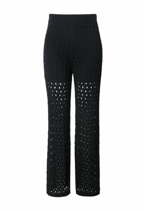 Schwarze gestrickte Hose mit lockerem Schnitt, die ein gemustertes offenes Gewebedesign aufweisen und einen bequemen elastischen Bund hat.