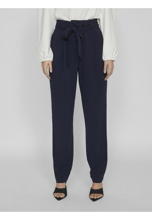 Pantalons taille haute marine avec une ceinture nouée, présentant un design de jambe fuselée. Fabriqués dans un tissu lisse et léger pour plus de confort.
