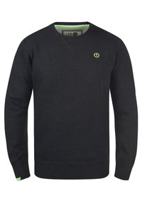 Black sweater with a V-neck design, featuring long sleeves and a green accent logo on the chest. Soft texture and ribbed cuffs.