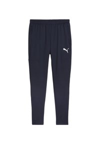 Marinefarbene Sporthose mit elastischem Bund, zwei Seitentaschen und weißem Puma-Logo. Hergestellt aus glattem Stoff mit schmal zulaufendem Bein.