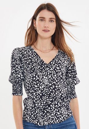 Blusa - black dot