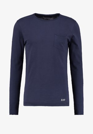 Long-sleeve navy blue T-shirt made of cotton, featuring a round neckline, chest pocket, and subtle brand lettering at the hem.