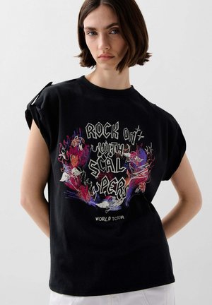 Black cotton t-shirt featuring a colorful graphic design with text "ROCK ON with SCALPERS WORLD TOUR." Rolled sleeves and relaxed fit.