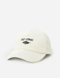 Witte corduroy pet met een gebogen rand, voorzien van het geborduurde 'Rip Curl' logo in het zwart, en een textuur van ribstof.