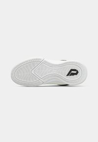 White athletic shoe sole with textured grip pattern and black logo detail. Features a rounded, segmented design for flexibility.
