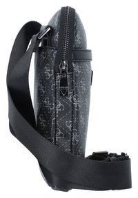 Black crossbody bag made of textured material, featuring a zip closure, logo pattern, and adjustable fabric strap.
