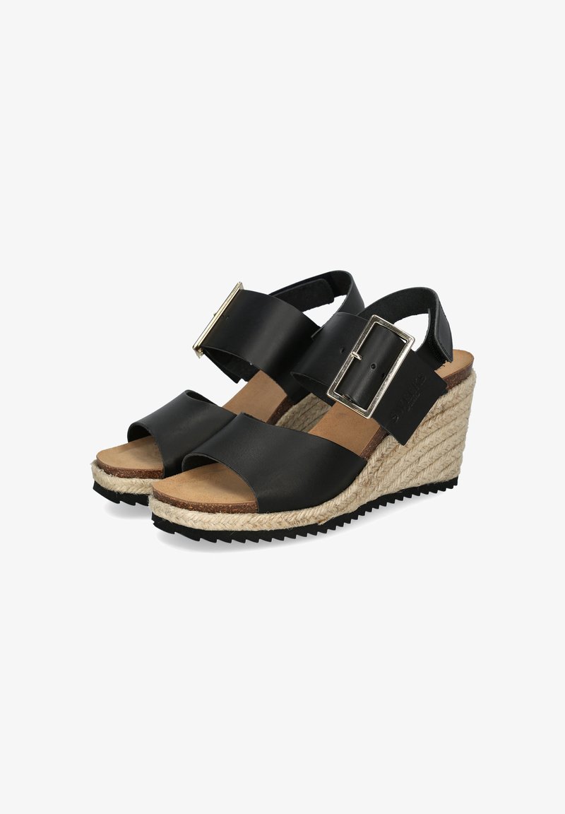 Black wedge sandals with two wide straps, a large silver buckle, and a jute-wrapped platform sole. Textured black rubber outsole for grip.