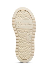 Krémová gumová podrážka s vlnkovým vzorem, s vyraženým nápisem "Naturino" a kulatým detailem. Lehce texturovaný povrch a zaoblený okraj.