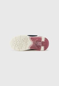 Shoe outsole with a white base, pink accents, star-patterned tread, and curved design. Smooth texture with visible cushioning elements.