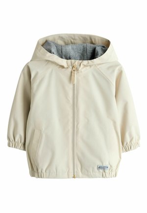 Kremowa dziecięca kurtka z kapturem, szara podszewka, zamek błyskawiczny z przodu, elastyczne mankiety i dwie przednie kieszenie.