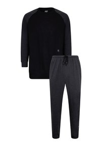 Black long-sleeve crewneck sweatshirt with dark gray raglan sleeves, paired with matching dark gray tapered jogger pants featuring an adjustable drawstring.
