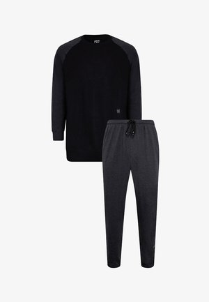 Sort langærmet sweatshirt med rund hals og mørkegrå raglanærmer, kombineret med matchende mørkegrå, tilspidsede joggingbukser med justerbar snøre.