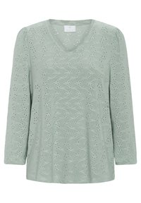 Haut vert clair à manches longues avec un col en V, présentant des motifs découpés élaborés, une texture douce et des détails de manches froncées.
