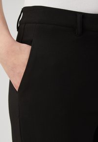 Guess ZOE PANTS - Hlače - jet black