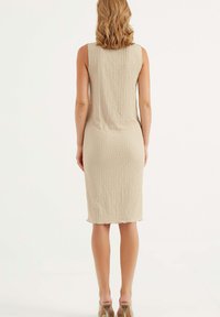 Herita Fodralklänning - beige