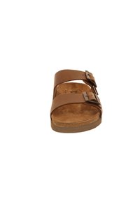 Brown leather sandal with two adjustable buckles, contoured cork footbed, and textured sole in a flat design.
