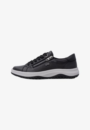 Baskets noires avec lacets noirs, fermeture éclair latérale et semelle blanche épaisse avec motif noir texturé, présentées de profil sur un fond uni.