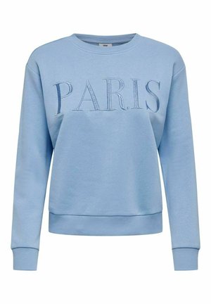 Lyseblå sweatshirt med rund halsudskæring og lange ærmer med "PARIS" broderet i store bogstaver tværs over brystet.