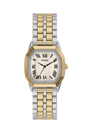 Zweifarbige gold- und silberfarbene Fossil-Armbanduhr mit achteckigem Zifferblatt, römischen Stundenmarkierungen und drei schwarzen Zeigern, die 10:09:36 anzeigen.