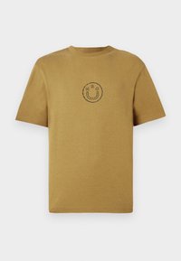 Short-sleeve mustard cotton t-shirt with a round neckline. Features a simple black smiley face logo in the center. Smooth texture.