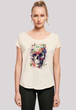 Cremfarbener Kurzarm-T-Shirt mit einem lebhaften floralem Totenkopf-Graphic, das mit komplexen Details und Mustern verziert ist. Weicher Stoff mit lockerer Passform.