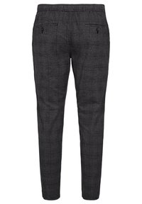 Grijze, gemusterde broeken met een slim fit, elastische tailleband en twee achterzakken. Gemaakt van een lichtgewicht stof met een subtiel ruitpatroon.