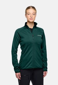 Giacca verde con zip realizzata in tessuto testurizzato. Presenta un collo alto e due tasche laterali con zip. Logo sul lato sinistro del petto.