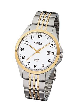 Montre à quartz avec un cadran blanc, bracelet en acier inoxydable doré et argenté, chiffres arabes et affichage de la date à 15 heures.