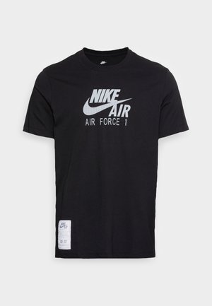 Black cotton t-shirt featuring "NIKE AIR FORCE 1" logo in white, crew neck, short sleeves, and a label at the hem with care instructions.