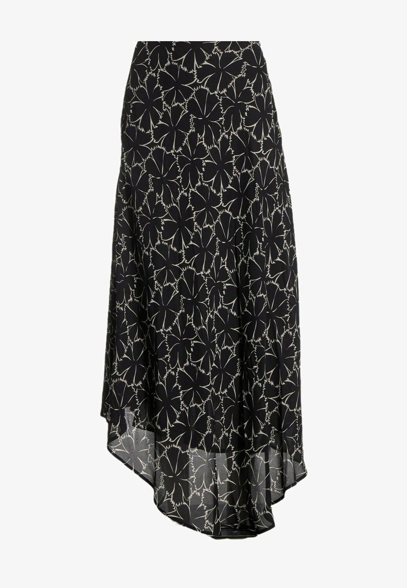 Jupe asymétrique noire avec grand imprimé floral blanc et tissu fluide, légèrement transparent.