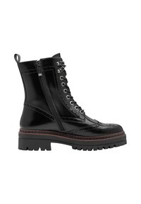 Botte de combat en cuir noir très brillant avec fermeture éclair latérale, devant à lacets, détails brogue, bordure marron, et semelle épaisse à crampons.