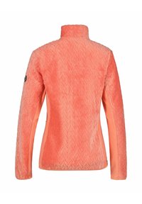 Koraal fleece jacket met een visgraatstructuur, hoge kraag en lange mouwen. Beschikt over een glad paneel aan de zijkant in contrastkleur.