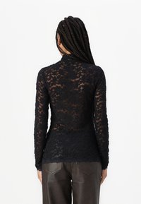 Rosemunde DELICIA - Pikkade varrukatega topp - black