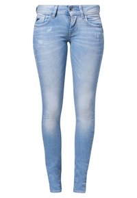 Jean skinny bleu clair avec légers détails usés, bouton et fermeture éclair à l'avant, passants de ceinture et style cinq poches.