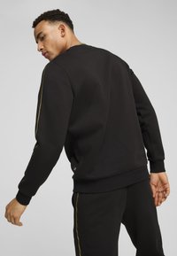 Puma ESS TAPE MINIMAL RUNDHALS - Sudadera - black