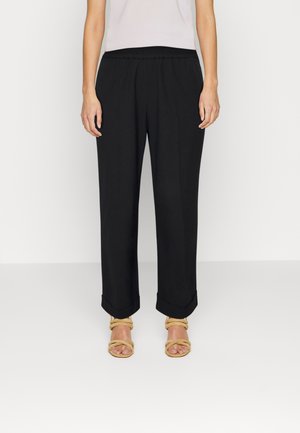 CHARINA - Kalhoty - black