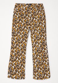 Pantalons évasés avec un fond blanc et un imprimé floral vif en orange, noir et marron. Dotés de poches et d'une fermeture à bouton.