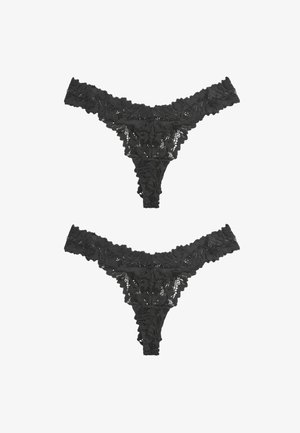 Black lace thong underwear features floral pattern with scalloped edges, showcasing intricate detailing and a soft, sheer texture.