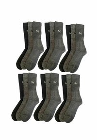 Set of eight socks in shades of gray and black. Ribbed top, medium thickness, features logo on upper. Soft texture and elastic fit.